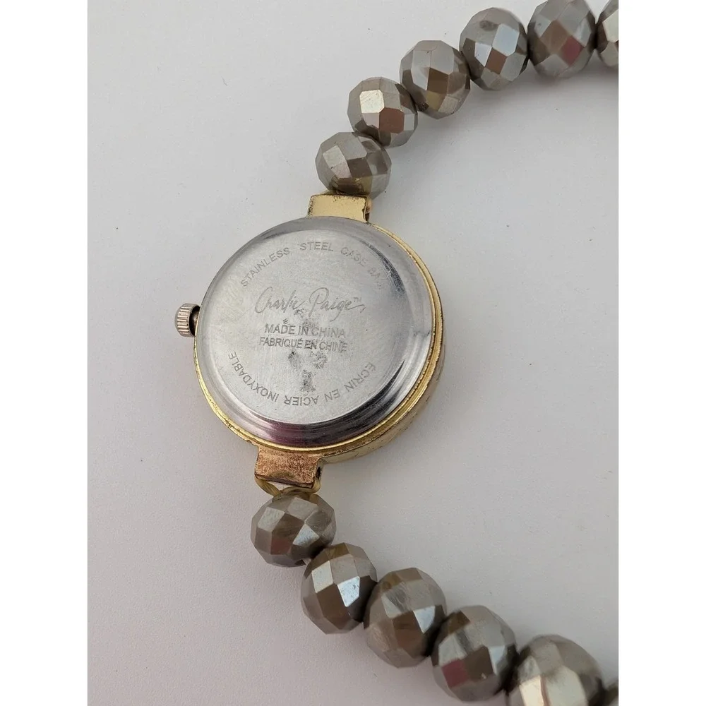 Charlie Paige Watch Women 25mm Gold Case Gray Beaded Stretch Band- New Battery‎